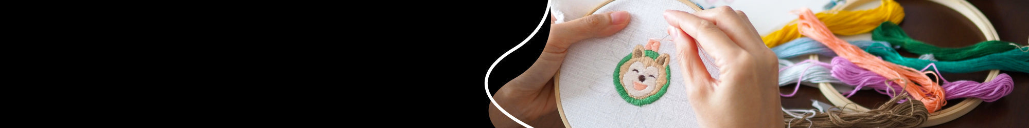 someone is creating a punch needle piece