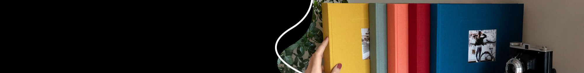 Many photo albums stored on a shelve