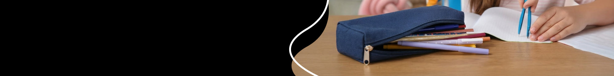 A green pencil case with pens